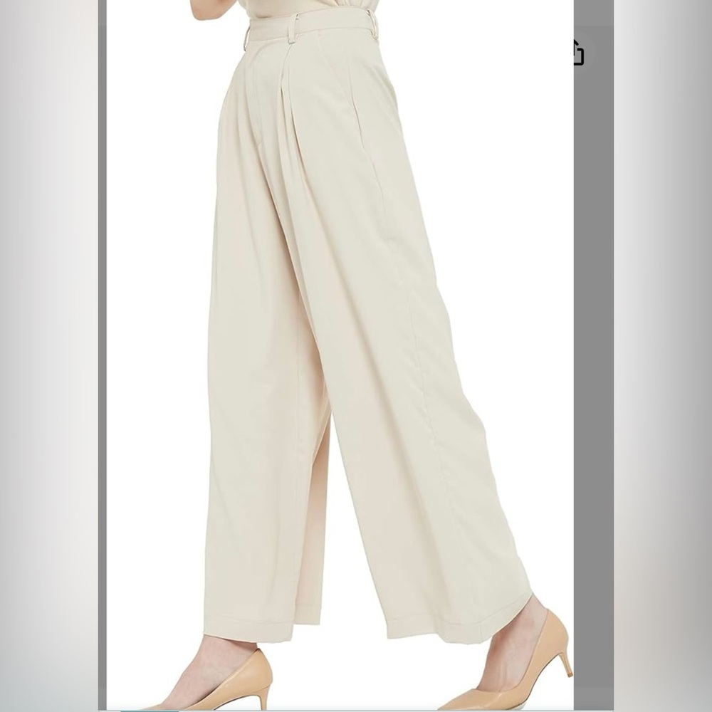 NWT. Tronjari High Waisted wide leg pants. Size M